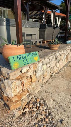 Φωτογραφία από το άλμπουμ του Beach house Hela - resort & tavern BAIN, free transport, pool, Island of Žut - Kornati σε Pristanišće