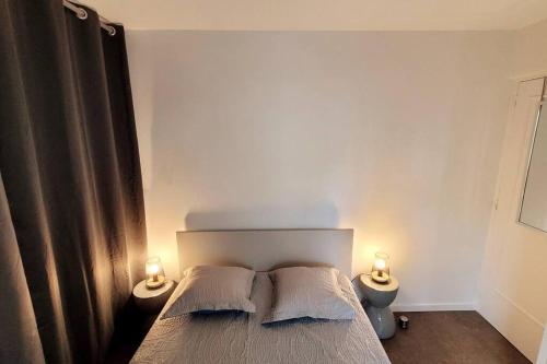 Posteľ alebo postele v izbe v ubytovaní Comme à la maison!!A 5 min à pied plage,pkg privé