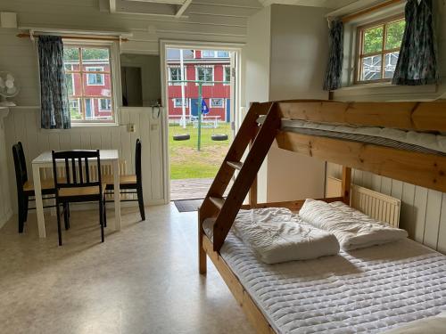 Postel nebo postele na pokoji v ubytování Aspan Kurs & Lägergård