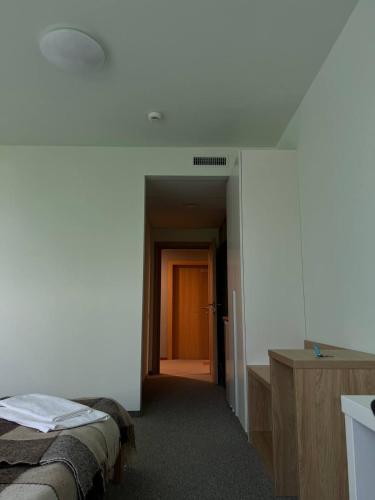 Cama o camas de una habitación en UCU INN - Кімнати для гостей