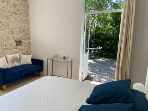 Lova arba lovos apgyvendinimo įstaigoje Mas de charme Jas de Berrias piscine proche Les Vans Ruoms Gorges Ardèche