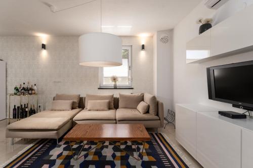 TV a/nebo společenská místnost v ubytování Villa Fio by SeeAdria Agency