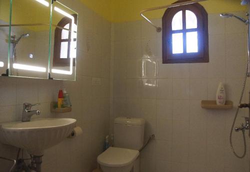 Ванная комната в Villa Desiree