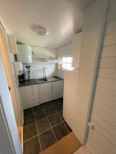 Cuisine ou kitchenette dans l'établissement Aspan Kurs & Lägergård