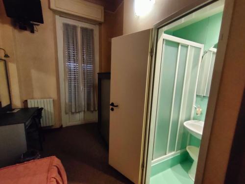 Koupelna v ubytování Hotel Ada