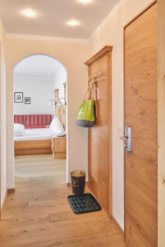 Una cama o camas en una habitación de Hotel Gamsleiten