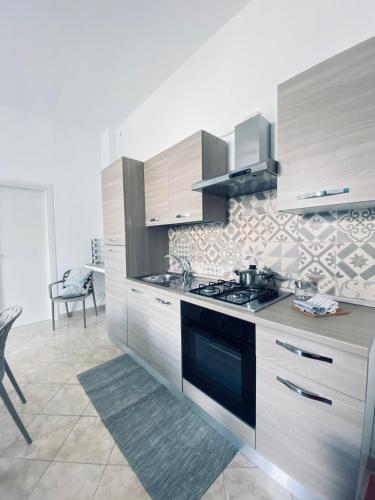 Kuchyňa alebo kuchynka v ubytovaní Casa Vacanze , Scoglitti