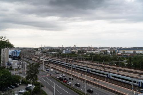a view of a city with a highway with cars at Apartamenty Przystanek Morska in Gdynia