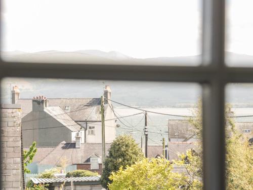a view from a window of houses and buildings at Gwel Y Môr in Beaumaris