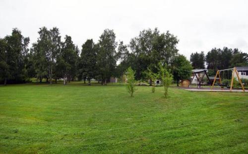 ein großes grünes Feld mit einem Fußballziel in der Unterkunft Private Room in Shared House-Close to University and Hospital-3 in Umeå