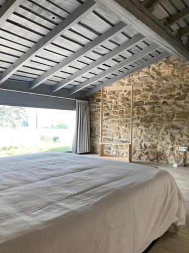 Ένα ή περισσότερα κρεβάτια σε δωμάτιο στο Casa para 8, Santillana y playas