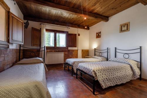 Postel nebo postele na pokoji v ubytování Casale I Cascetti