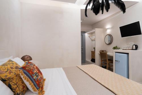 Thousand Stars Suites&Roomsにあるテレビまたはエンターテインメントセンター