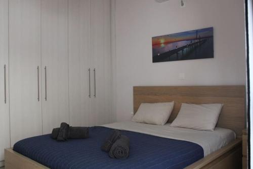 Ένα ή περισσότερα κρεβάτια σε δωμάτιο στο Irida's apartment in Porto Cheli