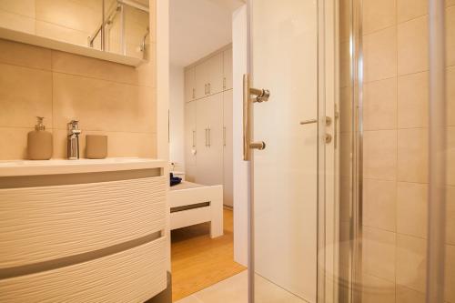 Koupelna v ubytování Apartment CasArosa