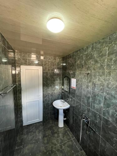 Ένα μπάνιο στο Ureki Beach Apartment