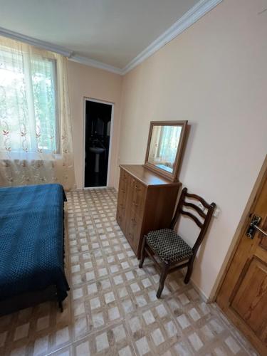 Ένα ή περισσότερα κρεβάτια σε δωμάτιο στο Ureki Beach Apartment