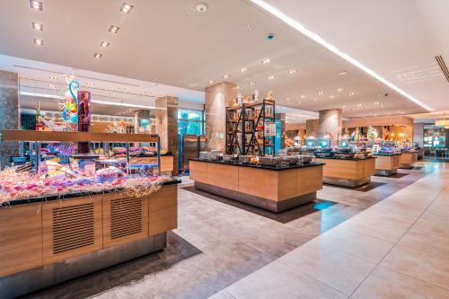 a store with several counters in a mall at Belek Beach Resort Hotel in Belek