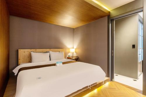 Ένα ή περισσότερα κρεβάτια σε δωμάτιο στο Sorgente Business Hotel