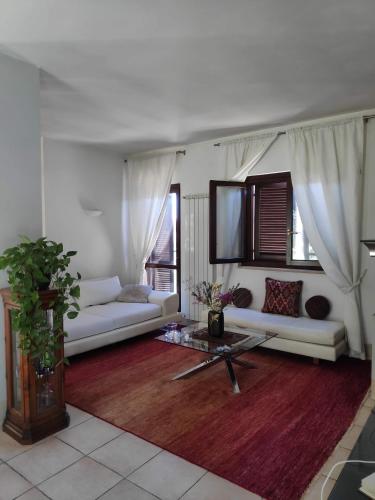 Ένα ή περισσότερα κρεβάτια σε δωμάτιο στο Casa di Rita