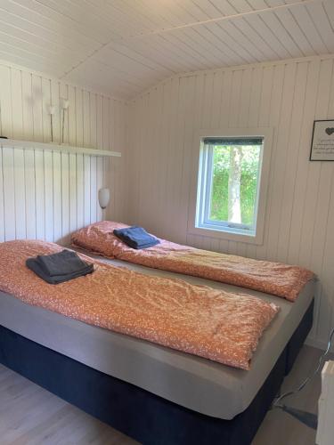 מיטה או מיטות בחדר ב-Pomonahouse