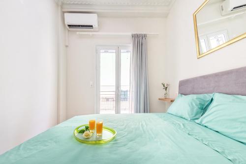 Кровать или кровати в номере Agatha's Flat - Corfu Town central apartment