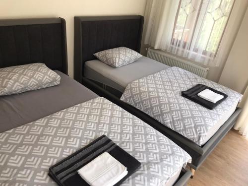 Postel nebo postele na pokoji v ubytování Ihlamurlu Home