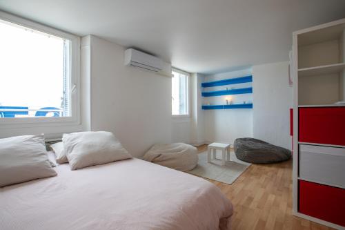 Posteľ alebo postele v izbe v ubytovaní Le Belvédère