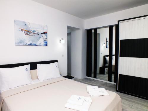 Krevet ili kreveti u jedinici u okviru objekta Ada Luxury Apartments 43