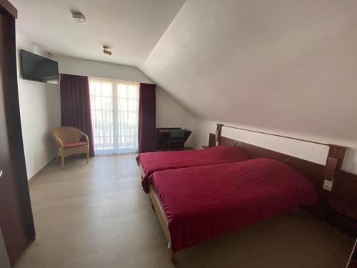 Una cama o camas en una habitación de Vakantiecentrum Zeelinde