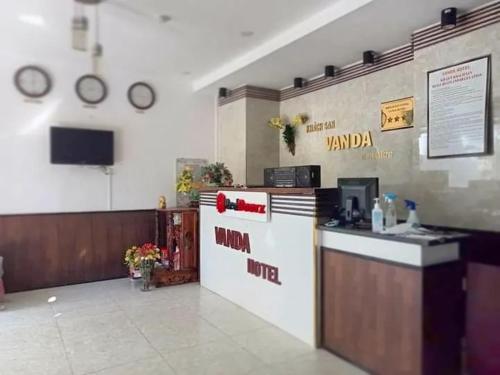 a lobby of a restaurant with a counter at VANDA Hotel Nha Trang in Nha Trang