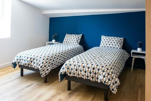 Postel nebo postele na pokoji v ubytování chambres d'hote Maeva