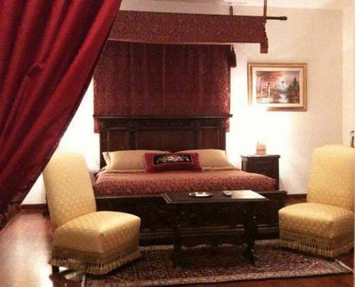 Letto o letti in una camera di Villa La Cerretana