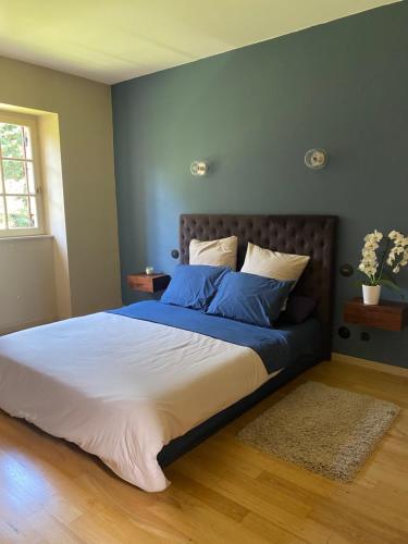 Ένα ή περισσότερα κρεβάτια σε δωμάτιο στο Villa & Spa dans le Périgord