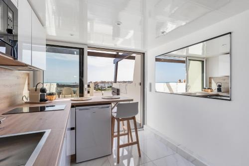 Fotografie z fotogalerie ubytování Black Jack naturiste Port Nature coursive vue mer v destinaci Cap d'Agde