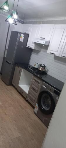 Kjøkken eller kjøkkenkrok på 1-комнатная квартира