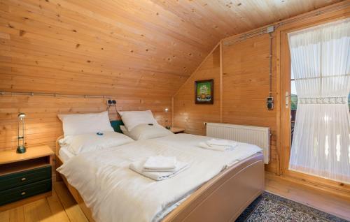 Ένα ή περισσότερα κρεβάτια σε δωμάτιο στο Vidikovac
