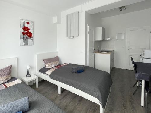 Ένα ή περισσότερα κρεβάτια σε δωμάτιο στο Schwanenburg Apartments