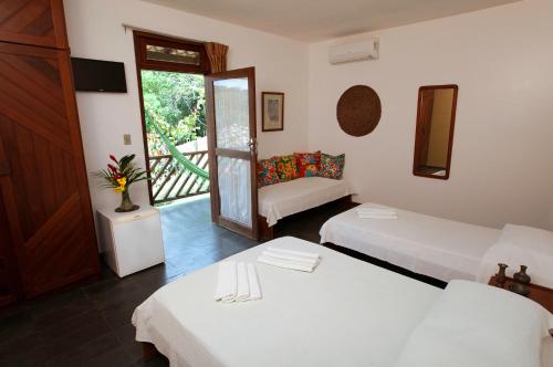 Ένα ή περισσότερα κρεβάτια σε δωμάτιο στο Hotel Vale do Jiquiriçá