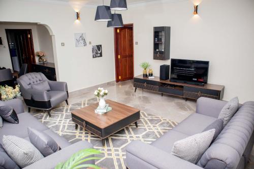Predel za sedenje v nastanitvi Lux Suites Eldoret Luxury Villas
