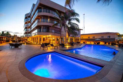 The swimming pool at or close to Village Barra Hotel