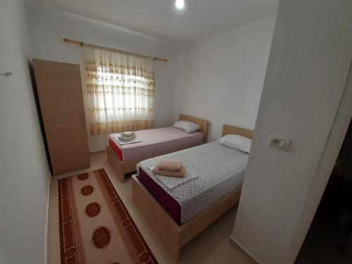 Katil atau katil-katil dalam bilik di Nesti Relax Home