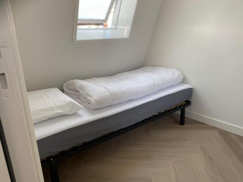 Postel nebo postele na pokoji v ubytování Luxe vakantiewoning in Domburg, Vaandragerstraat