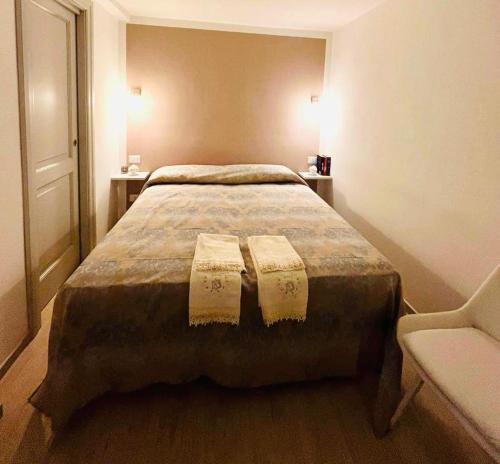Postel nebo postele na pokoji v ubytování A casa di Chloe