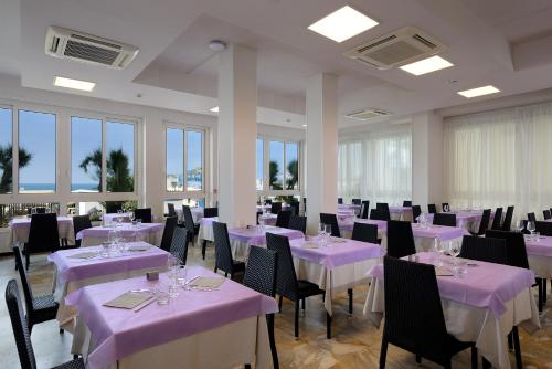 En restaurant eller et andet spisested på Hotel Excelsior