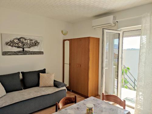 Posteľ alebo postele v izbe v ubytovaní Apartmani Mila A1 & A2 & 3