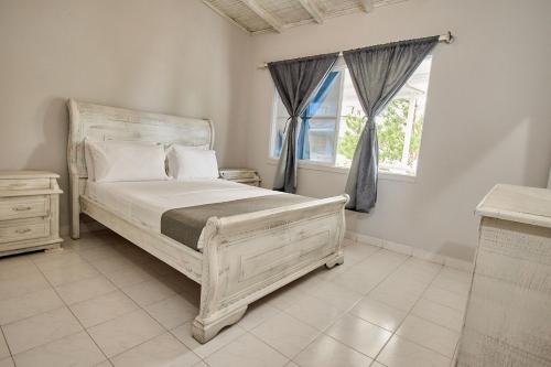 Postel nebo postele na pokoji v ubytování Kpré Coveñas by Bernalo Hotels