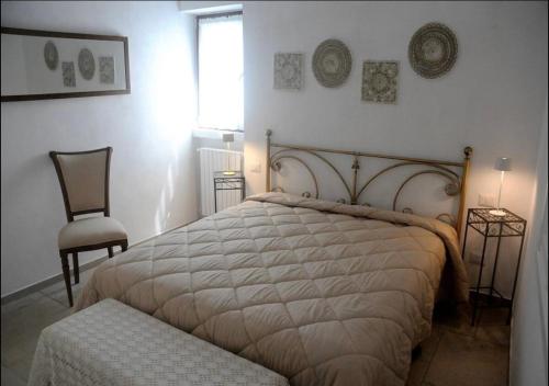 Llit o llits en una habitació de Belvedere di Puglia casa vacanza