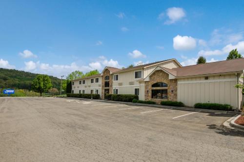 an empty parking lot in front of a building at Americas Best Value Inn & Suites Independence VA in Independence
