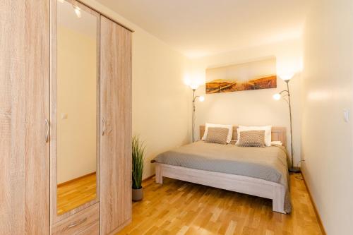Postel nebo postele na pokoji v ubytování Tallinna mnt 2, Apartment 3
